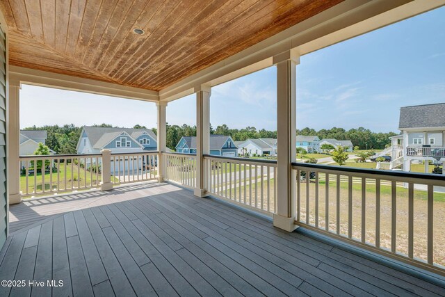 353 Spicer Lake Dr, Holly Ridge, NC 28445 - wooden deck with a residential view