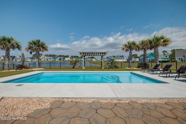 353 Spicer Lake Dr, Holly Ridge, NC 28445 - view of swimming pool featuring a patio and a residential view
