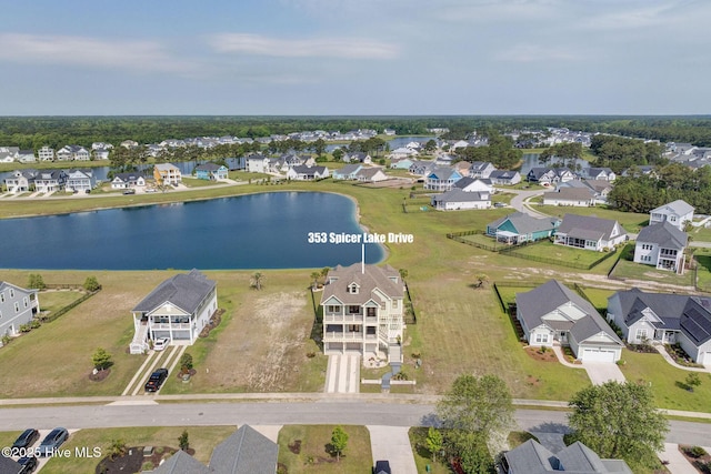 353 Spicer Lake Dr, Holly Ridge, NC 28445 - aerial view of residential area featuring a nearby body of water