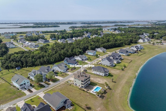 353 Spicer Lake Dr, Holly Ridge, NC 28445 - aerial view of residential area featuring a large body of water