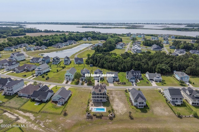 353 Spicer Lake Dr, Holly Ridge, NC 28445 - aerial overview of property's location featuring a large body of water and nearby suburban area