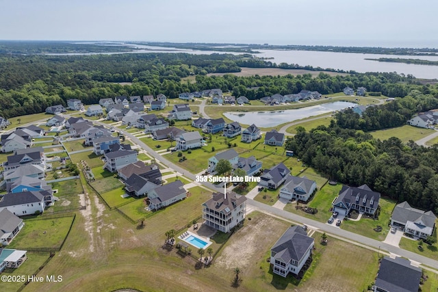 353 Spicer Lake Dr, Holly Ridge, NC 28445 - aerial view of property's location with a large body of water and nearby suburban area