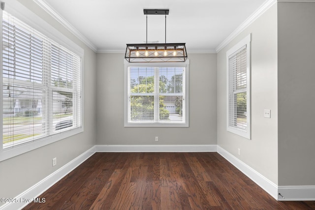 1213 Daisy Ct, Holly Ridge, NC 28445 - unfurnished dining area featuring crown molding, dark wood-style floors, and baseboards