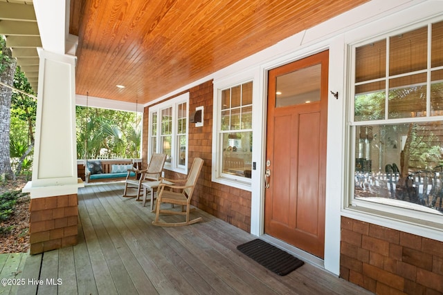 wooden deck featuring a porch