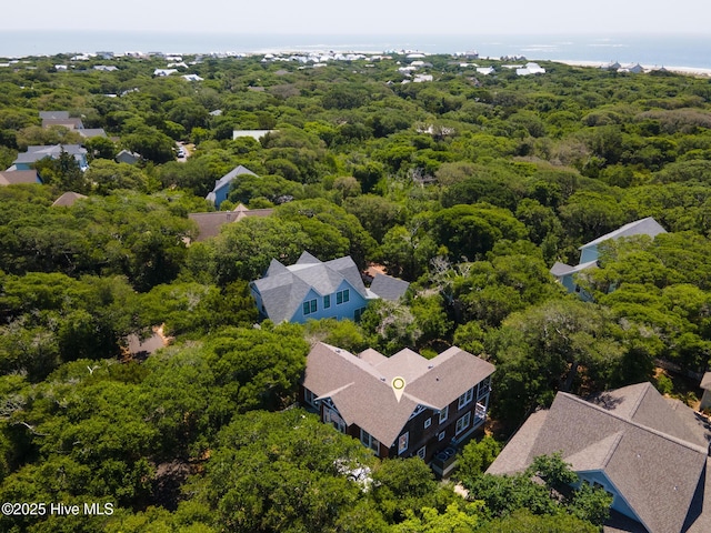 drone / aerial view of a heavily wooded area