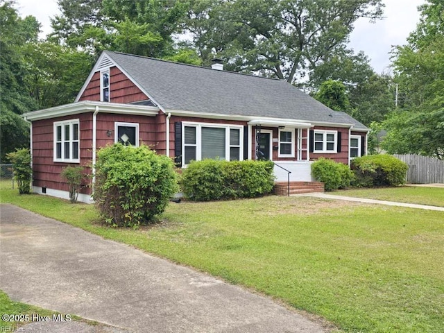 1111 Baxter St, Elizabeth City, NC 27909 - view of front of home with a chimney and roof with shingles