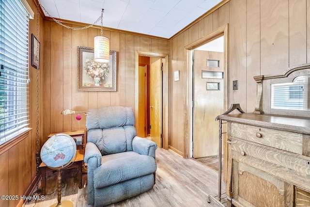1111 Baxter St, Elizabeth City, NC 27909 - sitting room featuring light wood-style flooring and wooden walls
