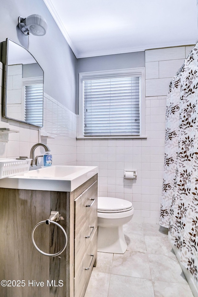 1111 Baxter St, Elizabeth City, NC 27909 - full bath featuring tile walls, vanity, curtained shower, and crown molding