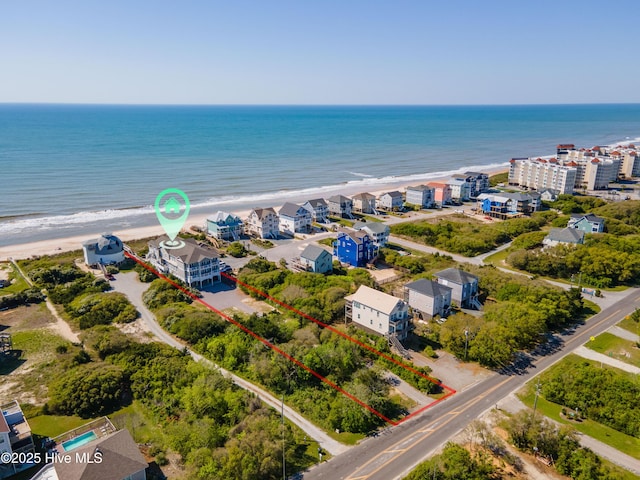 aerial view of property and surrounding area featuring unending shoreline and property boundaries highlighted
