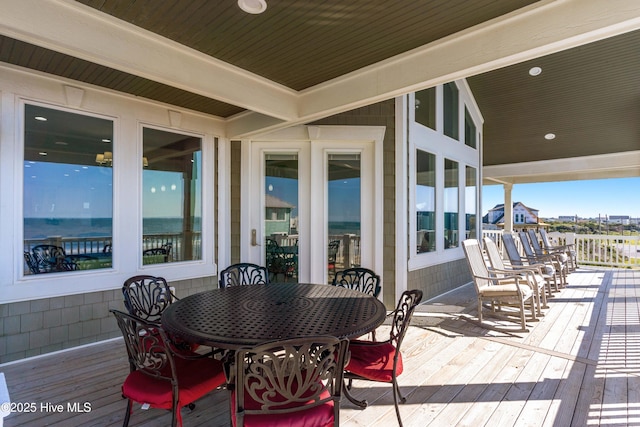 deck with outdoor dining space