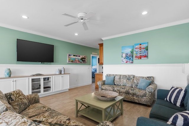 living room with ornamental molding, wainscoting, recessed lighting, a ceiling fan, and light tile patterned flooring