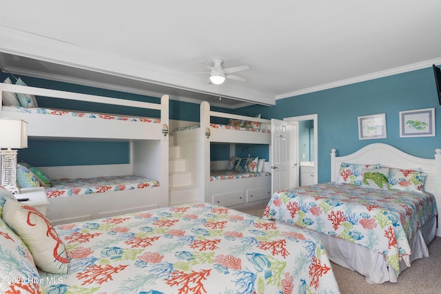 bedroom with crown molding, carpet, and a ceiling fan