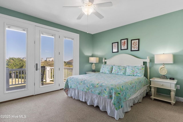 bedroom with access to exterior, carpet flooring, baseboards, and ceiling fan