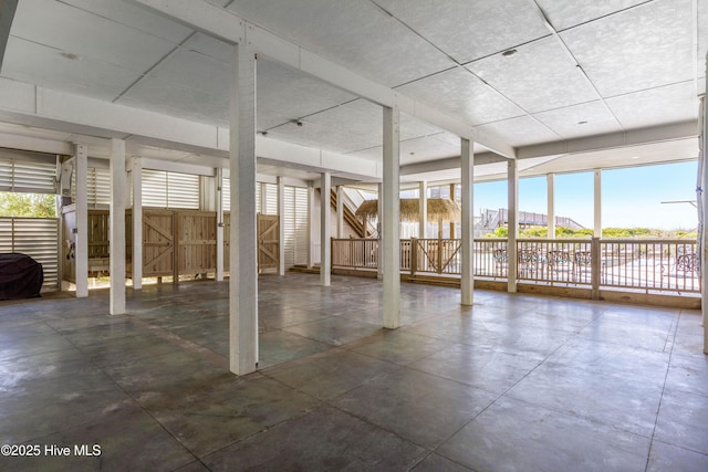 unfurnished sunroom featuring healthy amount of natural light