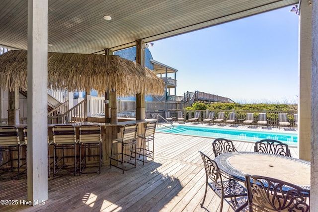 community pool with a deck