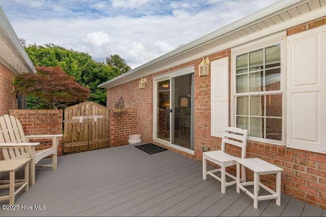wooden terrace with a gate