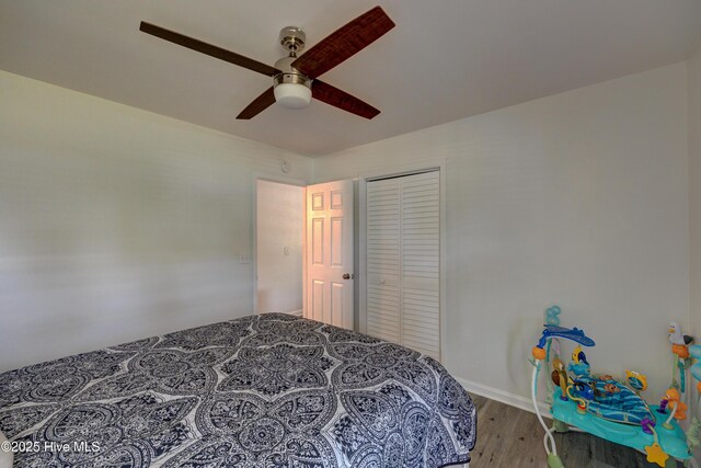 138 Cherokee Trl, Wilmington, NC 28409 - bedroom featuring wood finished floors, a closet, a ceiling fan, and baseboards