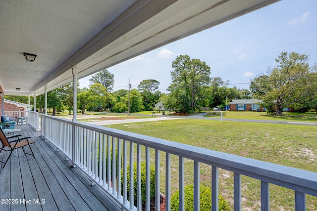 138 Cherokee Trl, Wilmington, NC 28409 - porch featuring a yard
