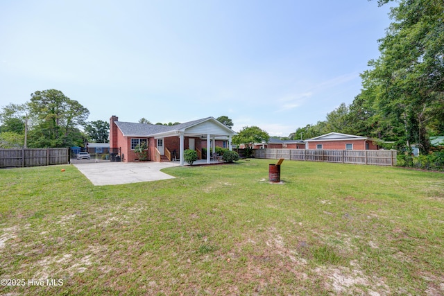 138 Cherokee Trl, Wilmington, NC 28409 - view of yard with a patio area