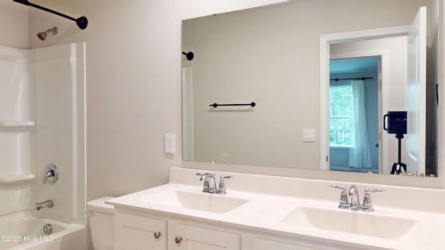 bathroom featuring tub / shower combination and double vanity