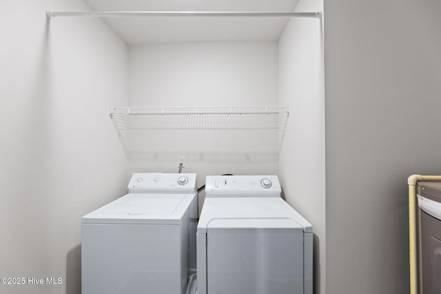 washroom featuring separate washer and dryer