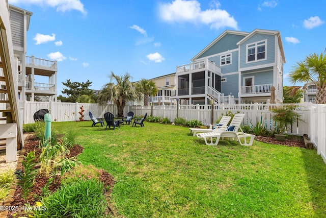 118 Clippership Dr, Holden Beach, NC 28462 - view of yard with an outdoor fire pit