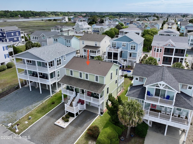118 Clippership Dr, Holden Beach, NC 28462 - aerial perspective of suburban area featuring a large body of water