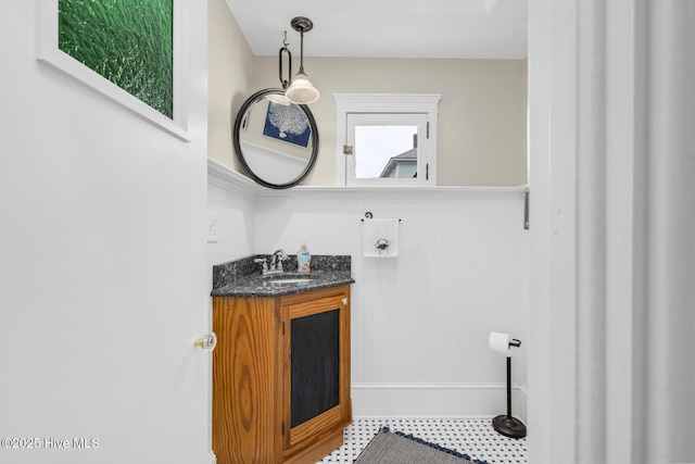 114 N Bonner St, Washington, NC 27889 - bathroom featuring a wainscoted wall and vanity