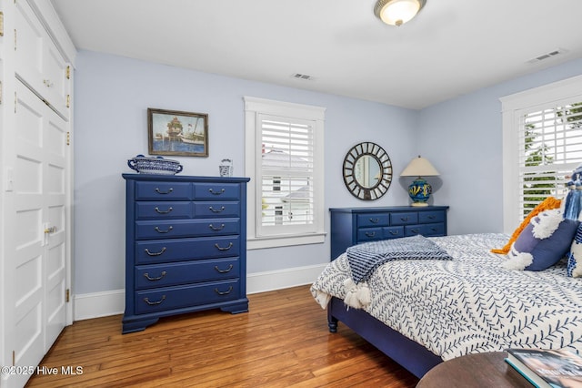 114 N Bonner St, Washington, NC 27889 - bedroom with baseboards and wood finished floors