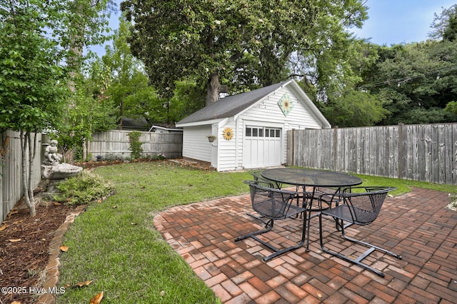 114 N Bonner St, Washington, NC 27889 - view of patio with outdoor dining area and an outdoor structure