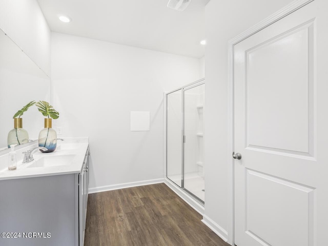 135 Legare St Lot 252, Wilmington, NC 28411 - full bathroom with wood finished floors, double vanity, a shower stall, and recessed lighting