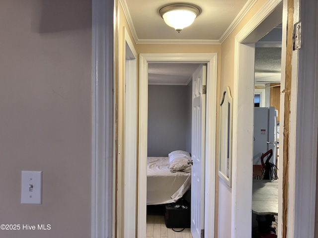 corridor featuring crown molding