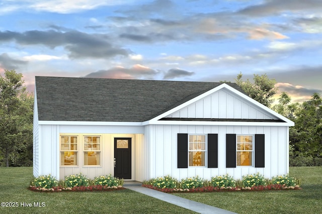 300 N Atlantic Ave Lot 189, Wilmington, NC 28411 - modern farmhouse style home featuring roof with shingles and a front lawn