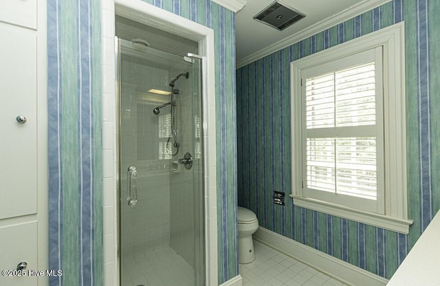 bathroom featuring wallpapered walls, tile patterned floors, ornamental molding, baseboards, and a shower stall