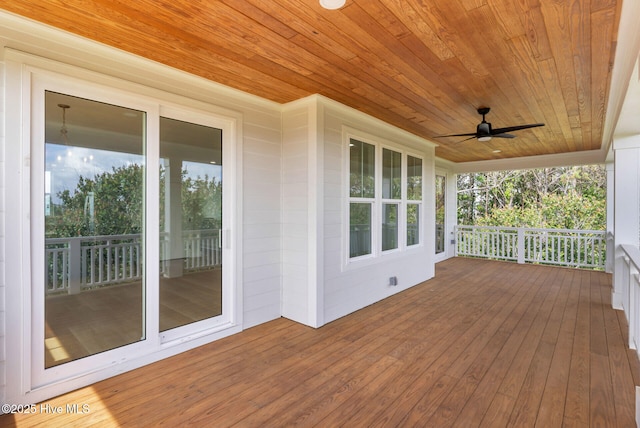 808 S 2nd St, Carolina Beach, NC 28428 - wooden deck with a ceiling fan and a porch