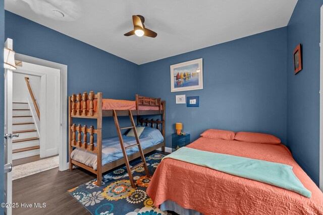 1711 S Anderson Blvd, Holly Ridge, NC 28445 - bedroom with wood finished floors, baseboards, and ceiling fan
