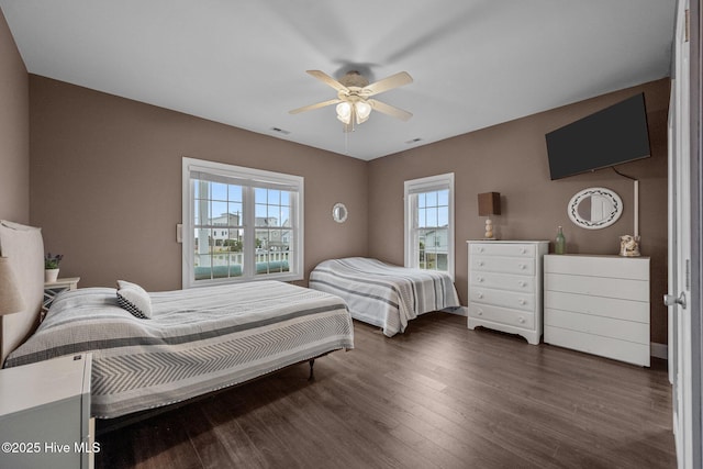 1711 S Anderson Blvd, Holly Ridge, NC 28445 - bedroom with wood finished floors and a ceiling fan