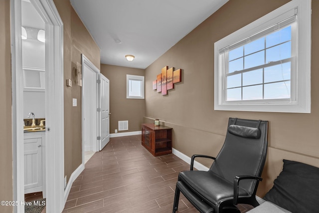 1711 S Anderson Blvd, Holly Ridge, NC 28445 - sitting room featuring baseboards