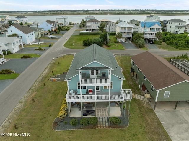 1711 S Anderson Blvd, Holly Ridge, NC 28445 - aerial view of residential area featuring a nearby body of water
