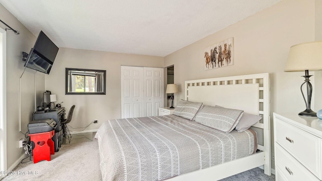 227 Foxkroft Dr Unit 9, Foxfire Village, NC 27281 - carpeted bedroom with baseboards and a closet