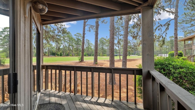227 Foxkroft Dr Unit 9, Foxfire Village, NC 27281 - wooden deck featuring view of scattered trees