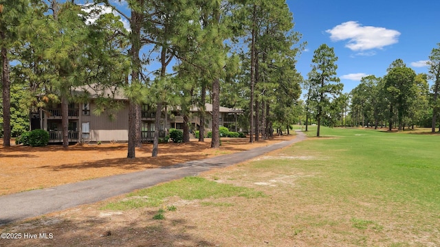 227 Foxkroft Dr Unit 9, Foxfire Village, NC 27281 - view of home's community with a lawn and view of wooded area