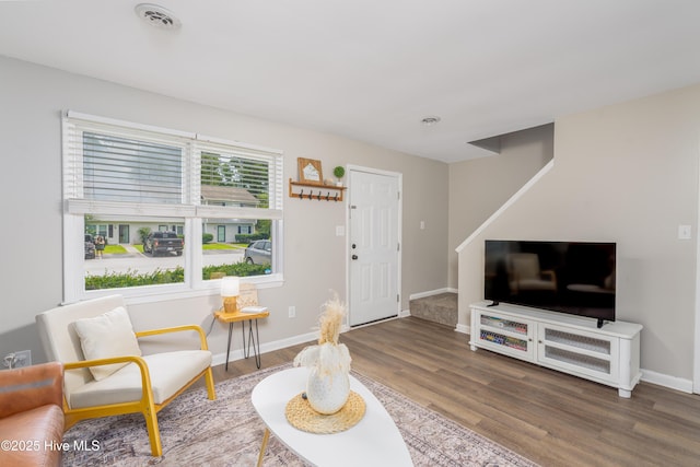 4 Port W Ct Unit C, Swansboro, NC 28584 - living area featuring wood finished floors and stairway