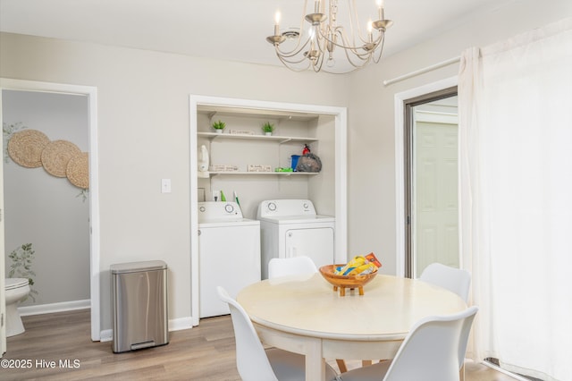 4 Port W Ct Unit C, Swansboro, NC 28584 - dining area featuring washing machine and dryer, a chandelier, and light wood-style floors
