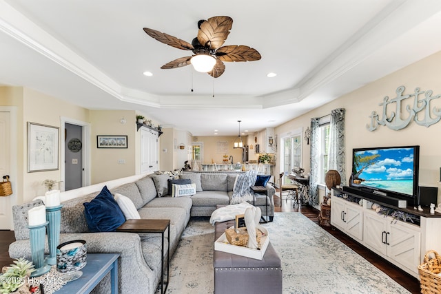 131 NE 33rd St, Oak Island, NC 28465 - living room with a raised ceiling, a ceiling fan, recessed lighting, and dark wood finished floors