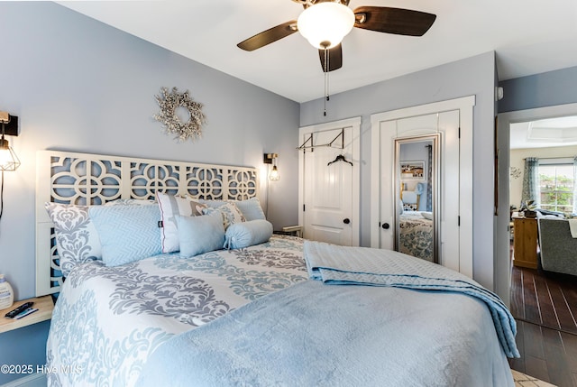131 NE 33rd St, Oak Island, NC 28465 - bedroom featuring wood-type flooring and ceiling fan