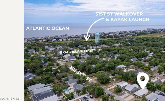 131 NE 33rd St, Oak Island, NC 28465 - aerial view of residential area featuring a large body of water
