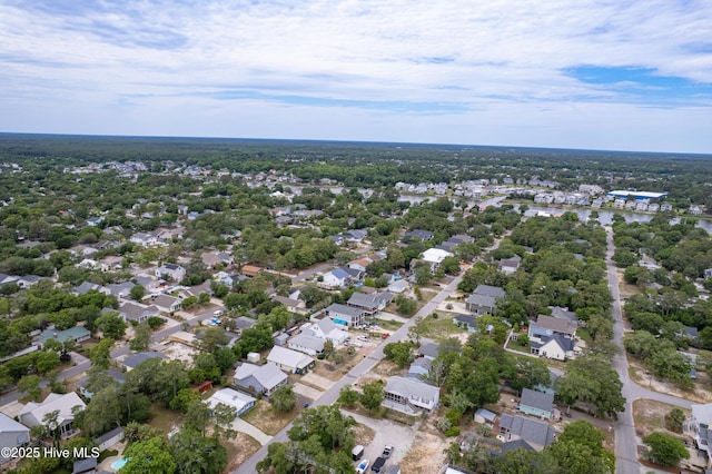 131 NE 33rd St, Oak Island, NC 28465 - aerial view of property and surrounding area featuring nearby suburban area