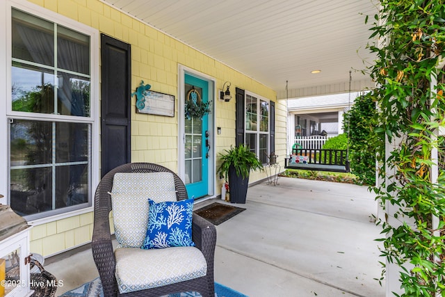 131 NE 33rd St, Oak Island, NC 28465 - view of covered porch