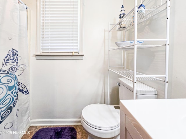 889 NC Highway 37 N, Gates, NC 27937 - full bathroom featuring baseboards, toilet, and vanity